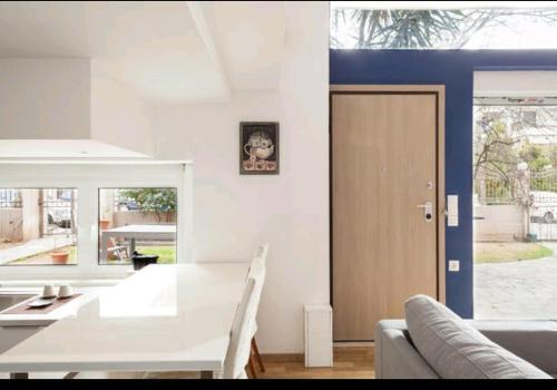 BRIGHT MEZZANINE FLAT WITH GARDEN