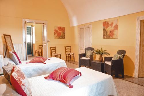 A bed or beds in a room at Casa Vacanza GICO'