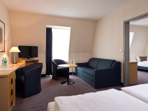 Postel nebo postele na pokoji v ubytování ACHAT Hotel Dresden Elbufer