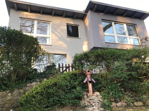 Κήπος έξω από το Ferienhaus TRAUM AM SEE mit Sauna und Whirlpool