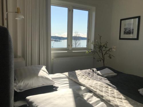 Postel nebo postele na pokoji v ubytování Sjövillan B&B