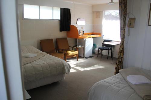 Postel nebo postele na pokoji v ubytování Taihape Motels