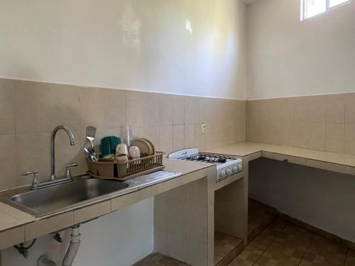 Η κουζίνα ή μικρή κουζίνα στο Hotel Paraíso Kora