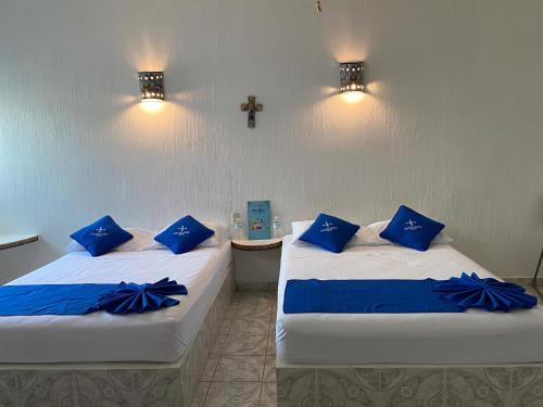 Ένα ή περισσότερα κρεβάτια σε δωμάτιο στο Hotel Paraíso Kora