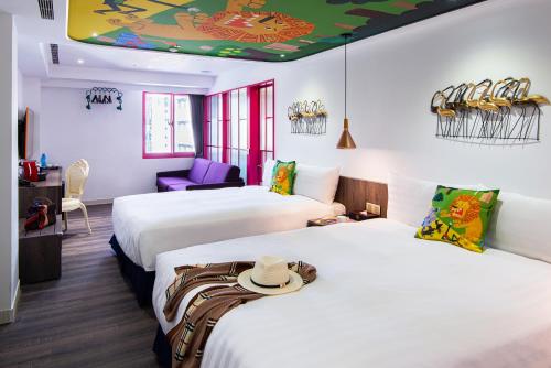 Cama o camas de una habitación en Norway Forest Travel hotel 1 Taichung
