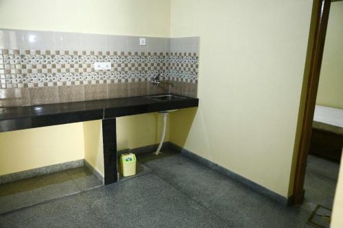Kuchyň nebo kuchyňský kout v ubytování Nest Guest House