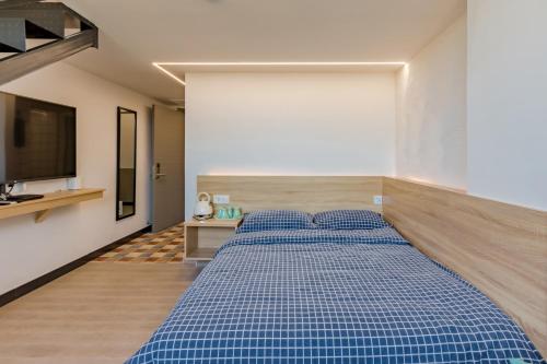 Gambar di galeri bagi Kunlun Youth Boutique Hostel di Jilian