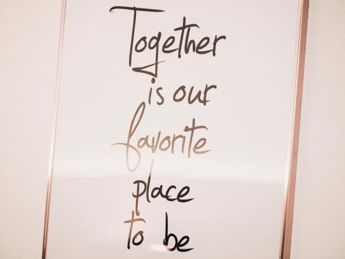 a sign that says together is our favorite place to be at Leuhaus in Mayrhofen