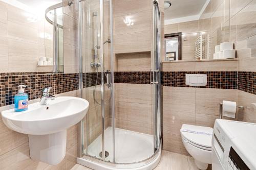 Koupelna v ubytování Apartamenty Zdrojowa