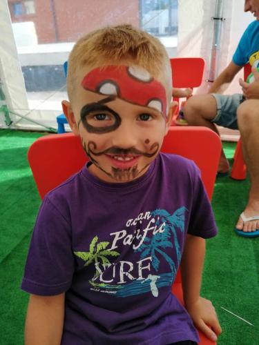 a young boy with a face painting on at STELLA Resort & SPA in Władysławowo