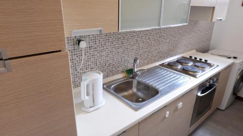 A kitchen or kitchenette at VILLA CRISTINA N.6