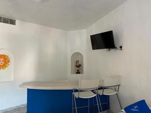 Μια τηλεόραση ή/και κέντρο ψυχαγωγίας στο Hotel Paraíso Kora