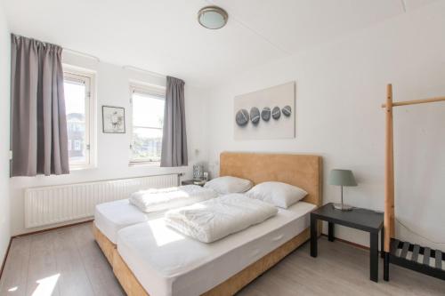 Postel nebo postele na pokoji v ubytování Middensluis Vakantiehuis