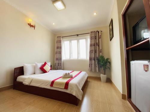 Postel nebo postele na pokoji v ubytování Dylan Hotel