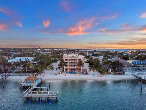 an aerial view of a beach with a resort at Hutchinson Island Hotel in Fort Pierce