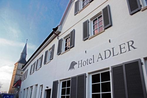 a building with the words hotel adler on it at Hotel Adler in Bad Friedrichshall