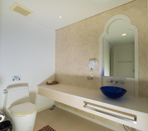 a bathroom with a toilet and a sink with a mirror at Marrakesh huahin 4bedrooms with seaview 248 in Hua Hin