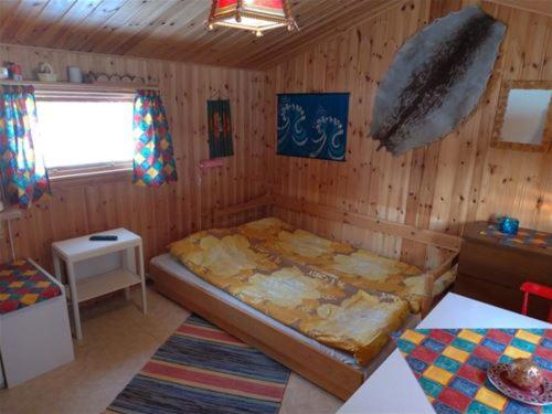 Кровать или кровати в номере Funäsdalens Stugby