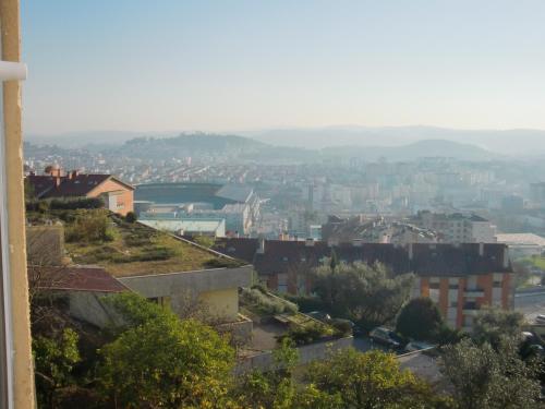 a view of a city from a building at CSI Coimbra & Guest House - Student accommodation in Coimbra