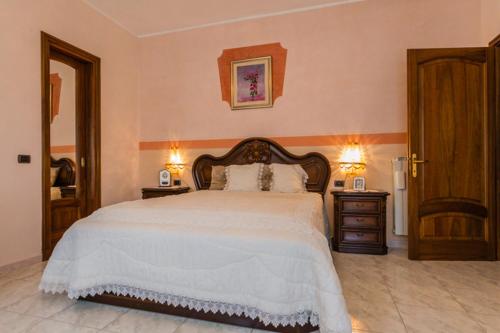 A bed or beds in a room at B&B Il Belvedere