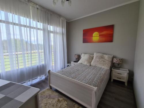 Ένα ή περισσότερα κρεβάτια σε δωμάτιο στο Apartment 101 for you
