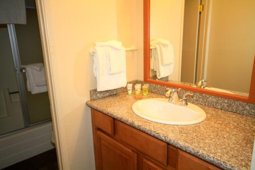 a bathroom with a sink and a mirror at Crestview #63 in Mammoth Lakes