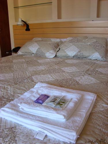Ένα ή περισσότερα κρεβάτια σε δωμάτιο στο Hotel Punta Lavalle