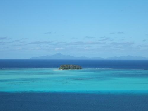a small island in the middle of the ocean at Hôtel Atiapiti in Opoa