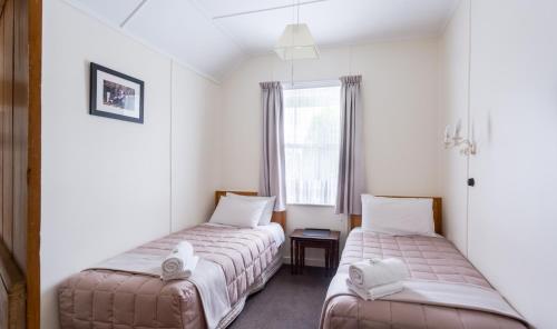 Кровать или кровати в номере The Greytown Hotel