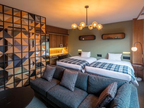 Postel nebo postele na pokoji v ubytování Twin-Line Hotel Karuizawa Japan