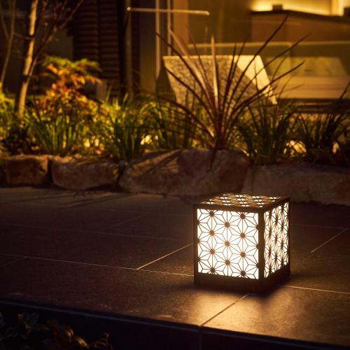 a lighted box sitting on the street at night at 凜庵 LIAN_KANAZAWA in Kanazawa