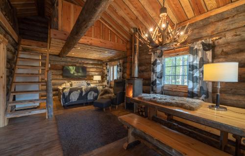 Ένα ή περισσότερα κρεβάτια σε δωμάτιο στο Wilderness Hotel Nellim & Igloos