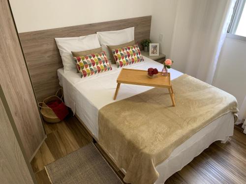 A bed or beds in a room at APARTMENTFORSTAY 20 EM MARiLIA TANGER