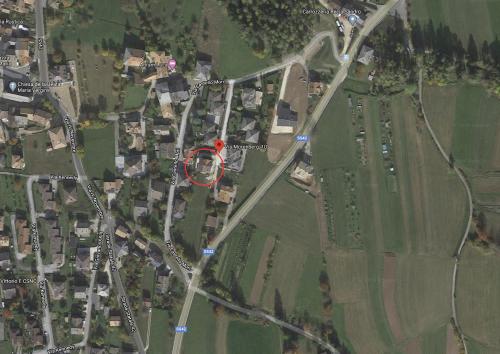 a map of a city with a red circle at Casa Elisa Apartments in Sarnonico