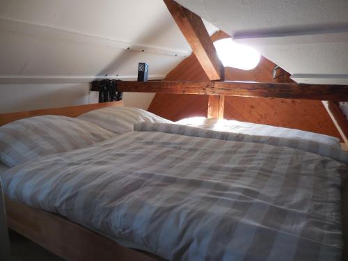 Ein Bett oder Betten in einem Zimmer der Unterkunft Bremer Bio Bleibe