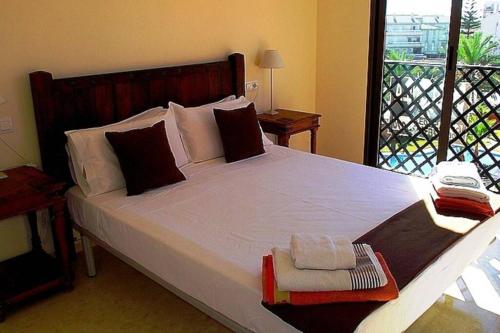 Posteľ alebo postele v izbe v ubytovaní Las Brisas Apartment, Salobrena