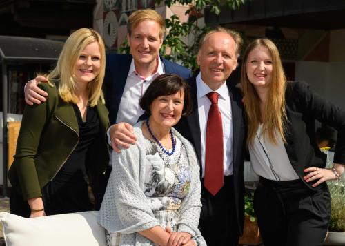 a group of people posing for a picture at Hotel & Art Kristiana in Saalbach Hinterglemm