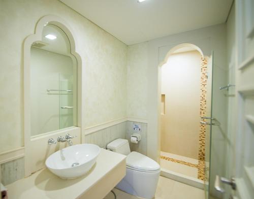 a bathroom with a sink and a toilet at Marrakesh Huahin 1 bedroom with pool access 307 in Hua Hin