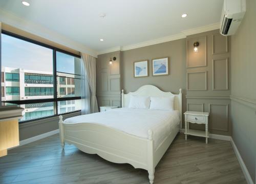 Postel nebo postele na pokoji v ubytování Marrakesh Huahin 1bedroom with seaview 148