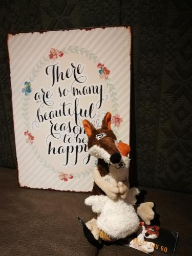 a stuffed dog is standing in front of a sign at Hotel Ehrwalderhof in Ehrwald