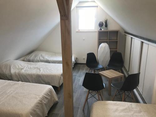 Postel nebo postele na pokoji v ubytování Auberge du Parc