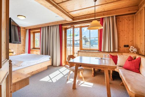 Postel nebo postele na pokoji v ubytování Gästehaus Stotter