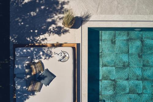 a close up of a picture of a swimming pool at Cielo villas - An Authentic Mediterranean Living in Zakynthos Town