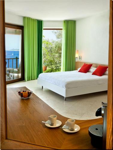 Ένα ή περισσότερα κρεβάτια σε δωμάτιο στο Hotel Villa Mahal