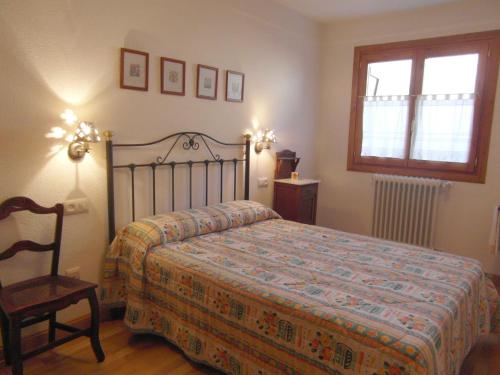 Een bed of bedden in een kamer bij B25 - La Granja, Bajo con jardín - Villmor