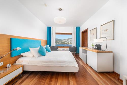 Ένα ή περισσότερα κρεβάτια σε δωμάτιο στο Hotel Villa Mahal