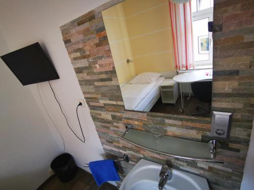 
Ein Badezimmer in der Unterkunft City Hostel
