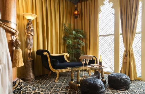 Χώρος καθιστικού στο Victorian Mansion Bed and Breakfast Inn