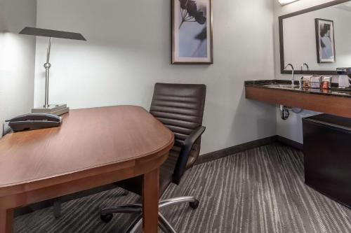 an office with a desk and a chair at Hyatt Place Richmond Arboretum in Richmond