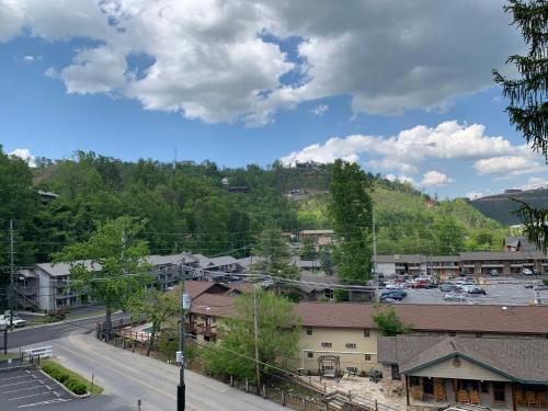 an aerial view of a town with a parking lot at Olde Gatlinburg Rentals in Gatlinburg